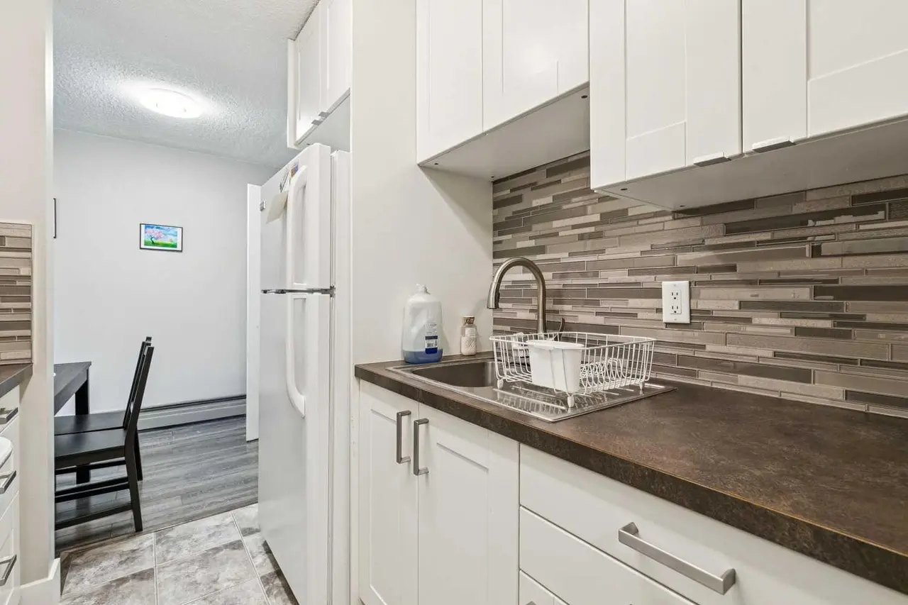 208, 315 Heritage Drive SE