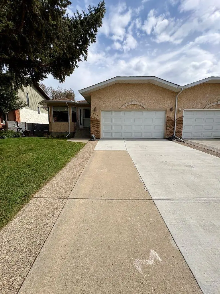 626 Prairie Meadows Close W